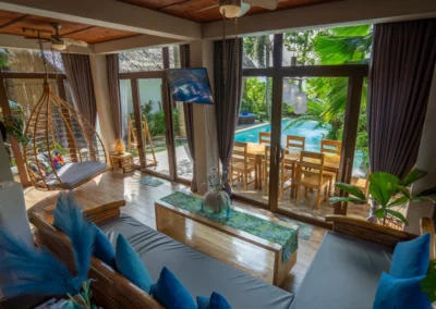 Villa living area with the view of private swimming pool.