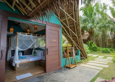 Garden view cottage with traditional Filipino bamboo and nipah roof